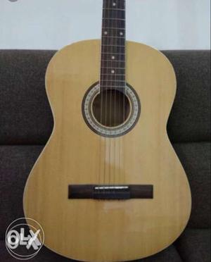 Acoustic pluto guitar, rate used for sale.