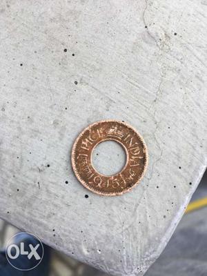 Copper-colored Indian 1 Pice Coin