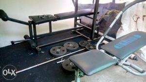 Gray And Blue Bench Press with 25kg rubber weight 2 bars