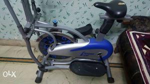 Gray And Blue Elliptical Trainer