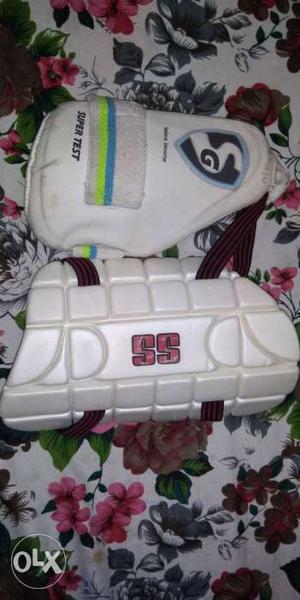 Pair Of Ss And Sg Cricket Thigh Guard