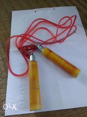 Red Jump Rope With Brown Handle