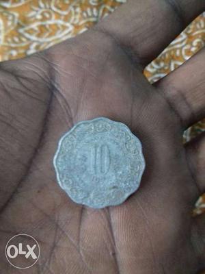Scalloped Silver-colored Indian Paise Coin