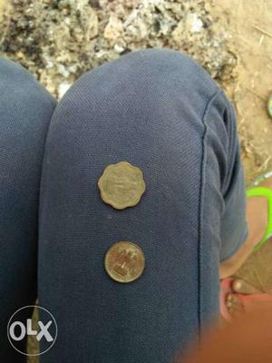 Two Copper-colored And Silver-colored Indian Coins