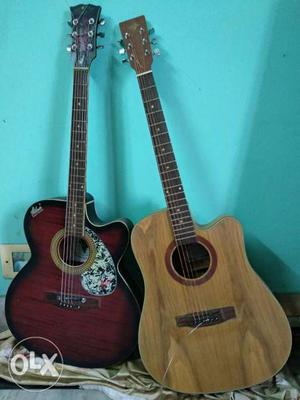 Two guitars with bags available at cheapest price! One plus