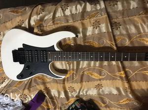 White Stratocaster-style Electric Guitar