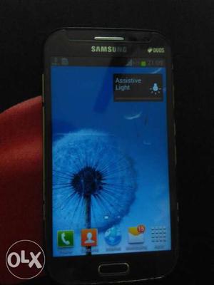 Samsung Galaxy Grand quattro + Flip cover + Box