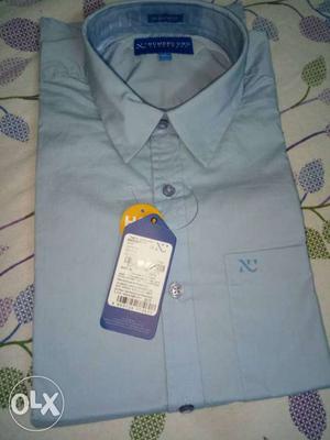Numero original men shirt with a tag of brand on