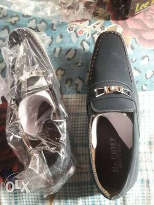 Pair Of Black Mr. Chief Leather Loafers