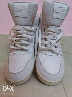 Pair Of Nike High-top Sneakers