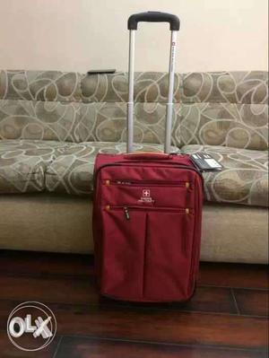 Red colour Trolley Bag