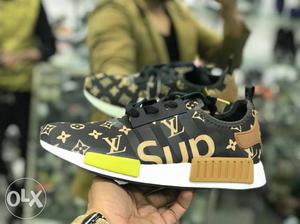 Unpaired Brown And Black Adidas NMD R1