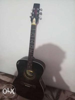 Black And Brown Acoustic Guitar