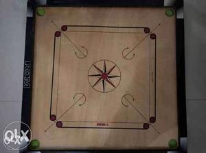 Black And Brown Carrom Board