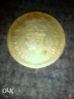 Round silver I colored Coin YEAR ,(One Rupee India).