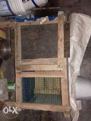 This is hen coop made with sheet wood and urgent