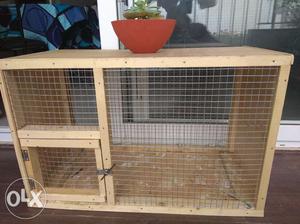 Wooden cage 1 month old. Selling as we 2 cages