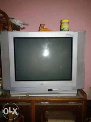 Gray CRT Television With TV Stand