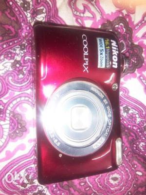 Red Nikon Coolpix Compact Camera