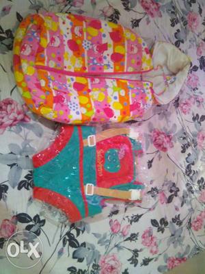 Baby carrier (unused) and baby sleeping bag