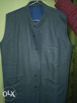 Blue woolen vestin very good condition. XL size