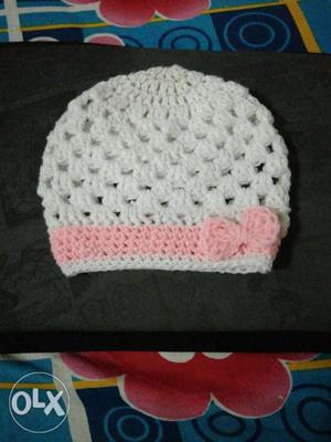 Hand made pinky wool hat for 0 to 1 year girl