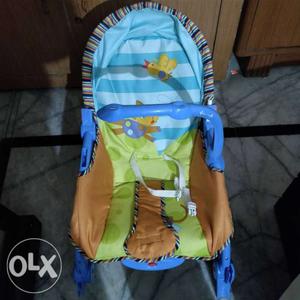 Hardly 1 month old rocking chair for kids. Battery operated.