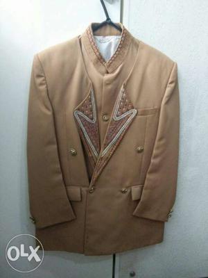 Size 9 boys Suit coat with waistcoat and trouser.