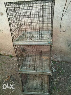 Three Gray Metal Pet Cages