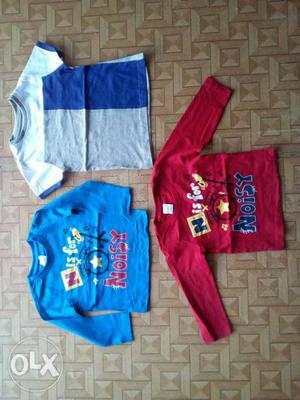 Toddler's White, Blue, And Red Shirts