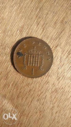 1 Gold-colored Penny Coin