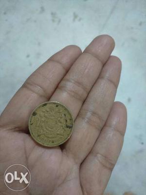 1pound, queen Elizabeth print year's old coin