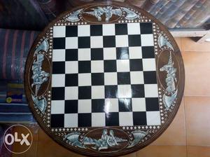 Antique small table. teak wood.with chess design