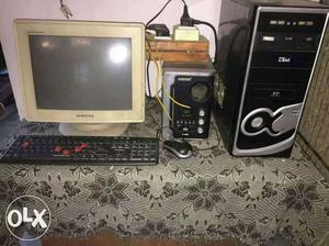 Beige CRT Computer Monitor, Mouse, Keyboard, UPS And