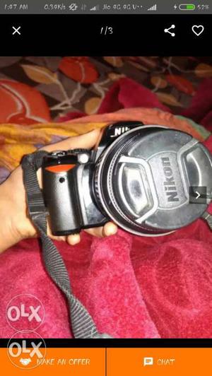 Black Nikon DSLR Camera