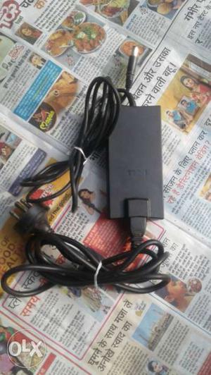 Black Nintendo Wii Console With Controller And Game Cases
