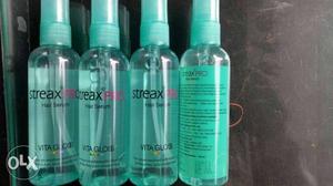 Four Streax Spray Bottles