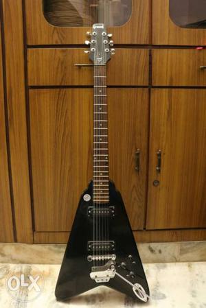 Grason Flying V electric guitar with hard shell