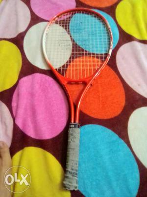 It's Cosco lawn tennis racket in good condition