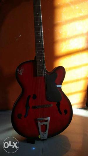 New condition guitar with guitar bag free, new string