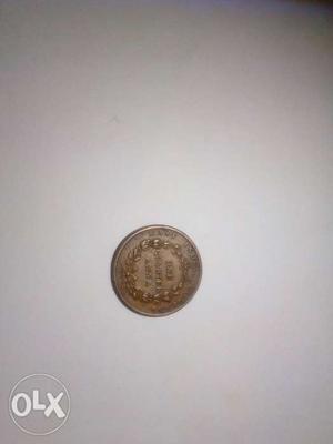 One quarter Anna.  coin
