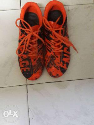 Pair Of Orange-and-black Soccer Cleats