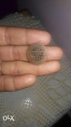Round Copper-colored Quarter Anna Coin