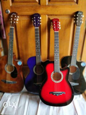 Several Cutaway Acoustic Guitars
