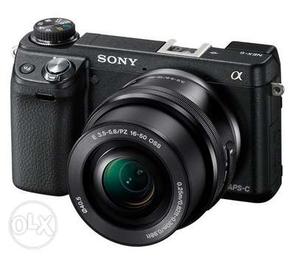 Sony Alpha NEX-6 Mirrorless Digital Camera + mm Zoom