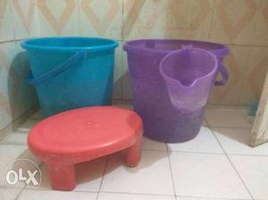 Two Teal And Purple Plastic Water Pails