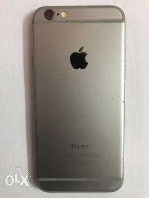 Iphone 6 64gb with charger scratches on sides.