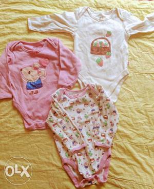 Unused onesies for 9-12 months old price includes