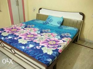 Blue And Multicolored Floral Bedspread