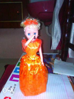 Girl With Orange Sleeveless Dress Doll